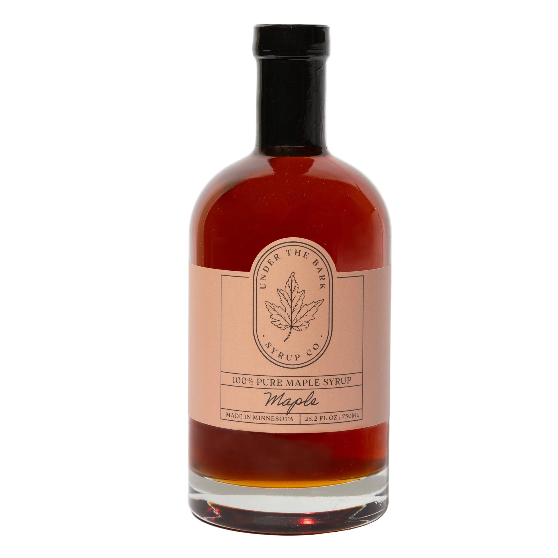 25 oz bottle of pure maple syrup from Under The Bark Syrup Co, showcasing the amber-colored syrup in a glass bottle.
