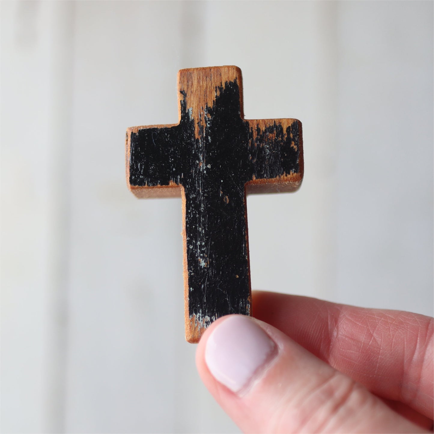 Handmade wooden pocket cross by Dennehey Design Co., small wooden cross for personal use or as a meaningful gift.