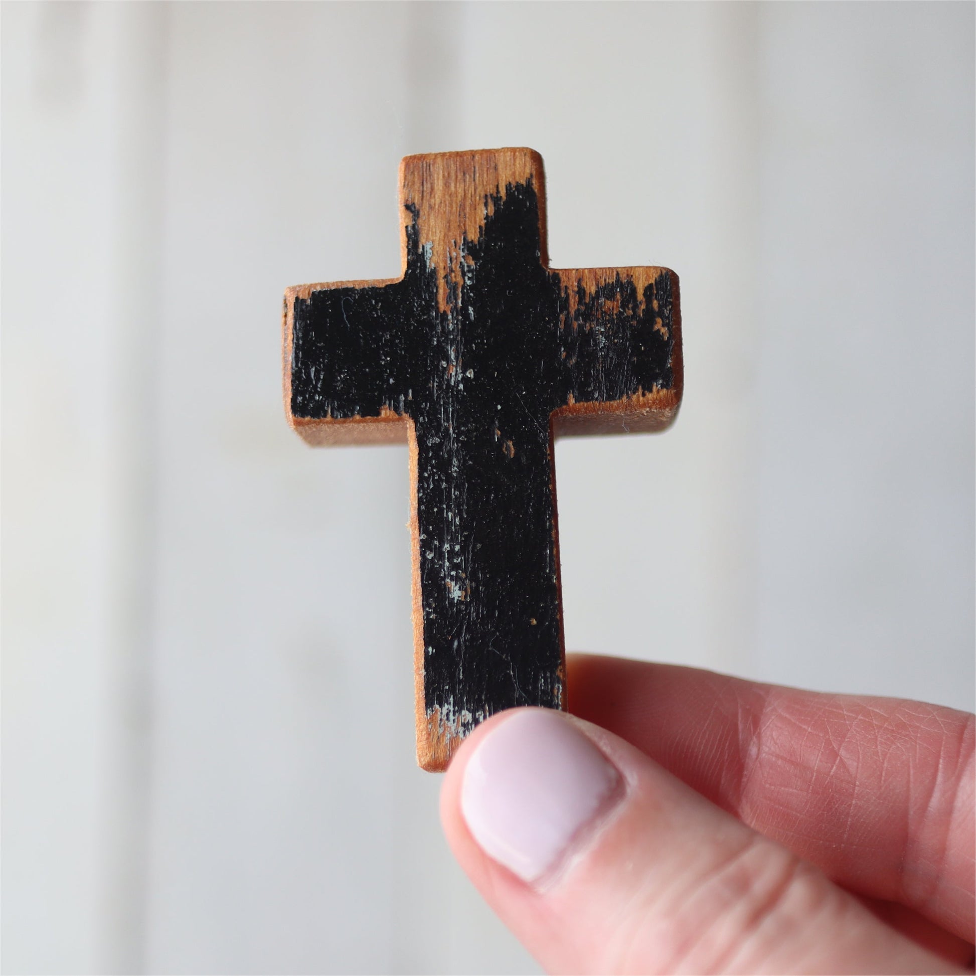 Handmade wooden pocket cross by Dennehey Design Co., small wooden cross for personal use or as a meaningful gift.