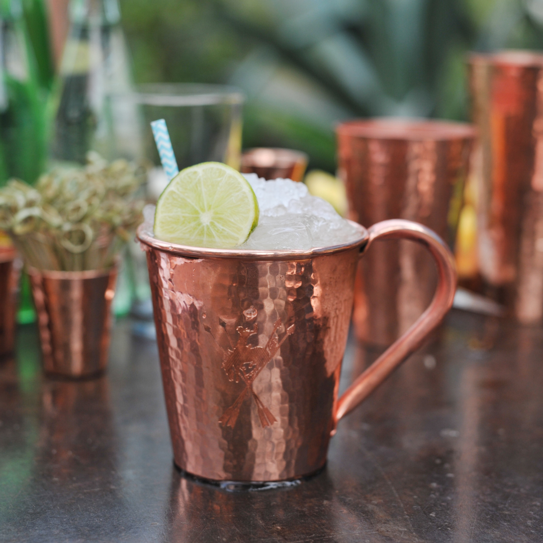 Solid copper mule mug with a copper handle, 18 oz capacity, by Sertodo, featuring a Mexican mule design on the mug.