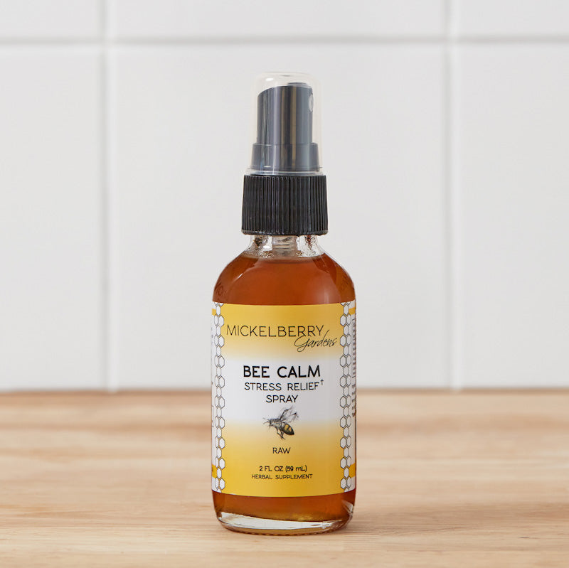 Mickelberry Gardens Bee Calm Stress Relief Spray in a 2oz honey tonic bottle with a natural label and dropper cap.