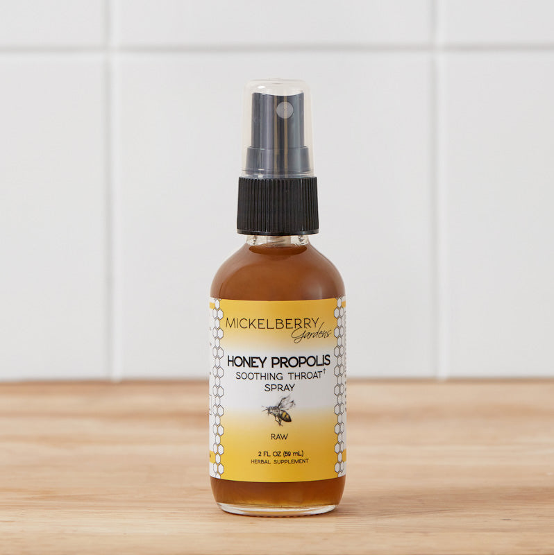 Mickelberry Gardens Honey Propolis Throat Spray in a 2oz bottle, natural honey tonic for soothing sore throats and throat health.