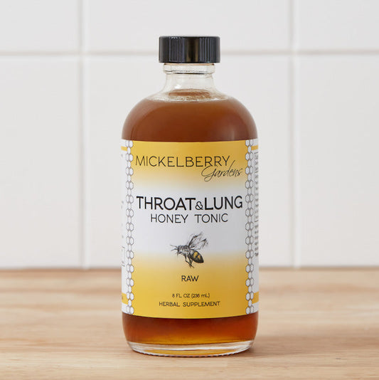 8oz bottle of Mickelberry Gardens Throat and Lung Honey Tonic with honey, herbs, and natural ingredients in a clear glass bottle.