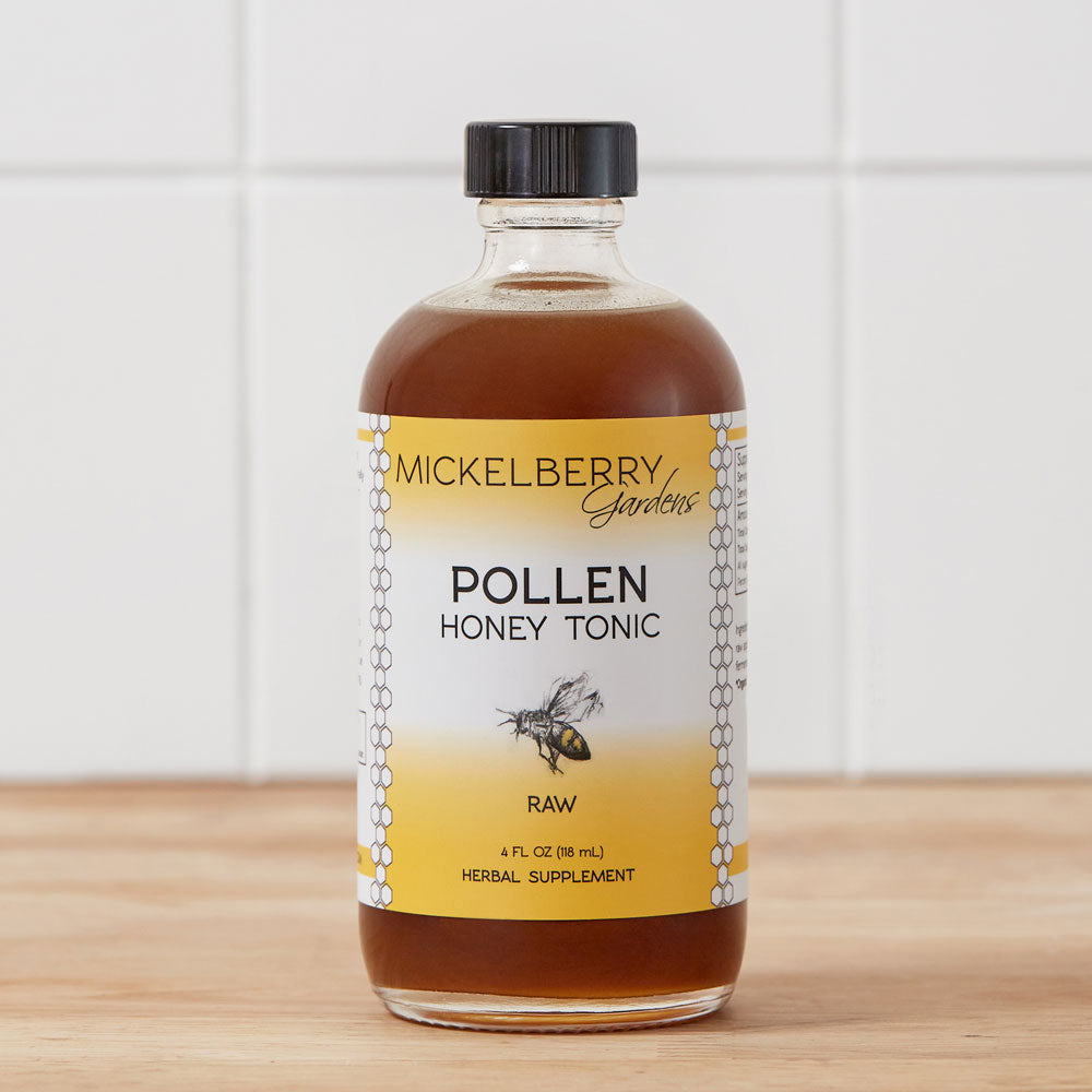 Mickelberry Gardens Pollen Honey Tonic with fermented local bee pollen and raw honey in a glass bottle.