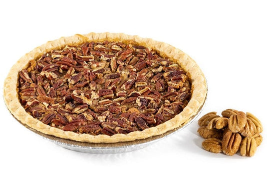 Millican Pecan Bourbon Pie with a golden crust and pecan topping, showcasing Southern-style pecan pie with bourbon flavor.
