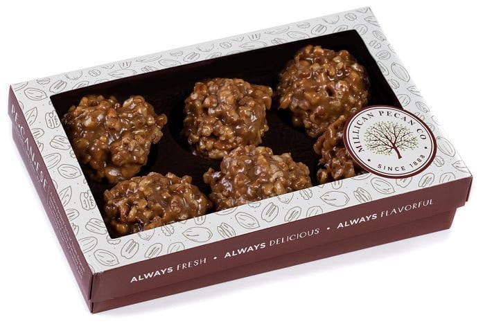 Millican Pecan Chewy Pecan Pralines in an 8oz gift box, showcasing glossy, caramelized pecan treats with a rich texture.