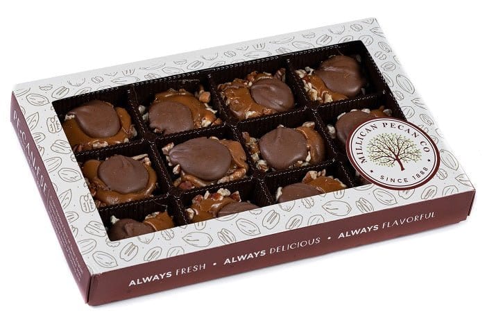 Millican Pecan milk chocolate Caramillicans gift box featuring pecan-filled chocolate treats in an 8oz box.