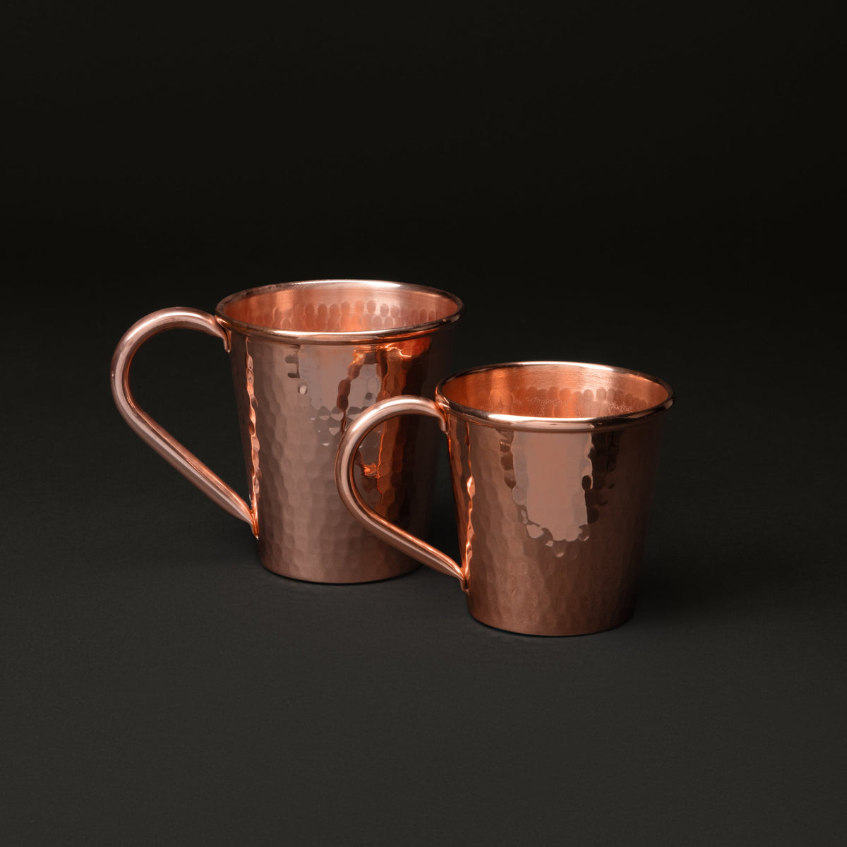 Solid copper mule mug with copper handle, 18 oz capacity, designed for Moscow mule cocktails by Sertodo.