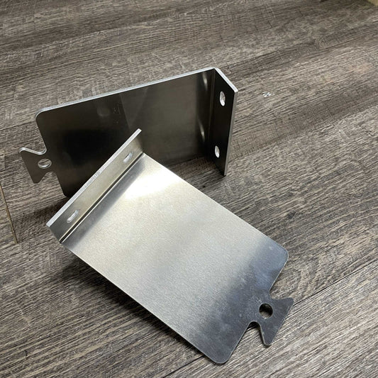 Bootstrap Farmer mounting cleats for securing equipment, shown in a close-up image with metal brackets and mounting hardware.