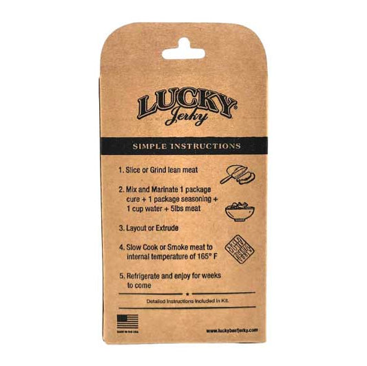 Back of Nebraska Star Beef Sweet & Spicy Jerky Making Kit box showing seasoning instructions and ingredients for homemade beef jerky.