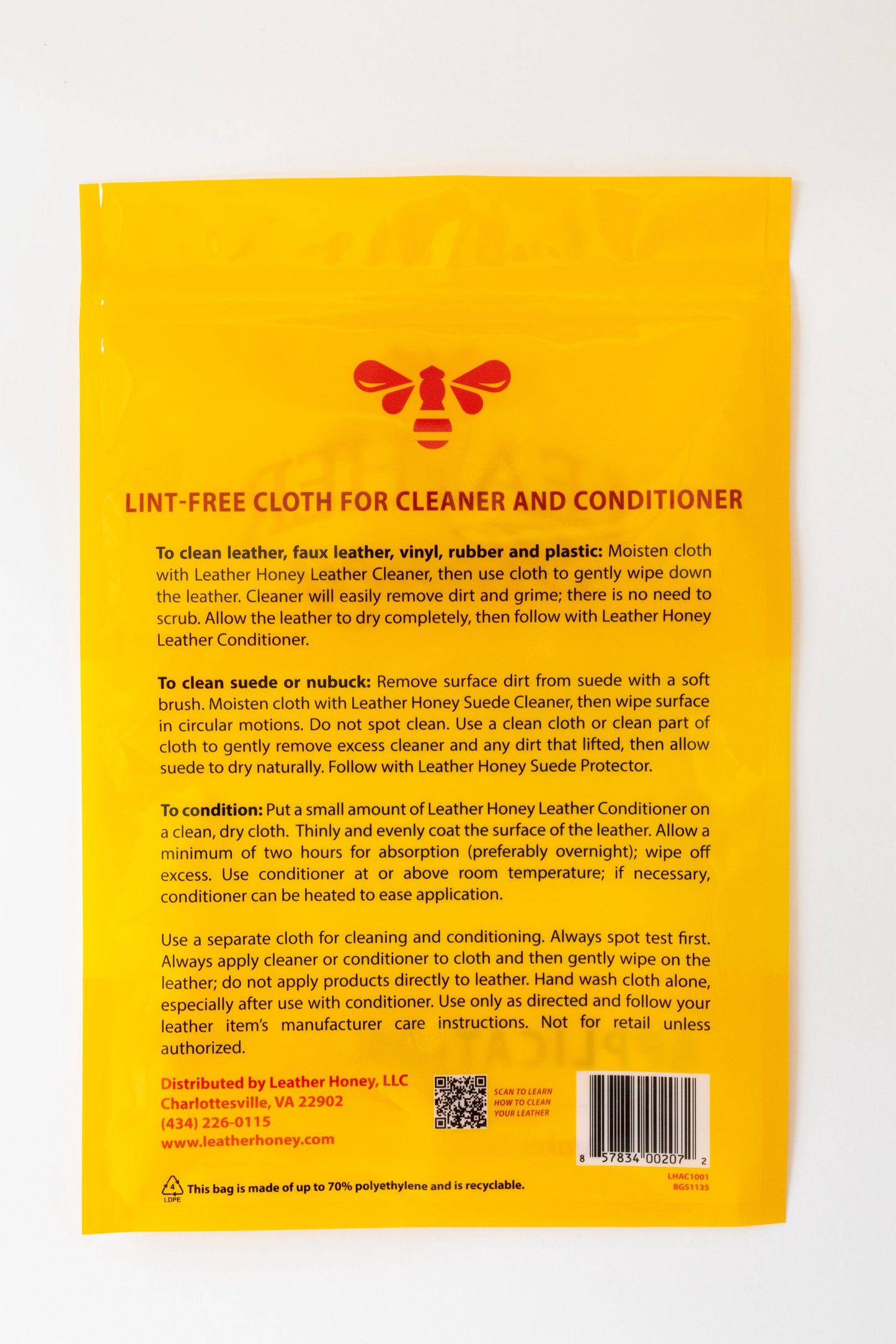 Leather Honey lint-free application cloth for leather care, shown in a close-up image of the new cloth on a leather surface.