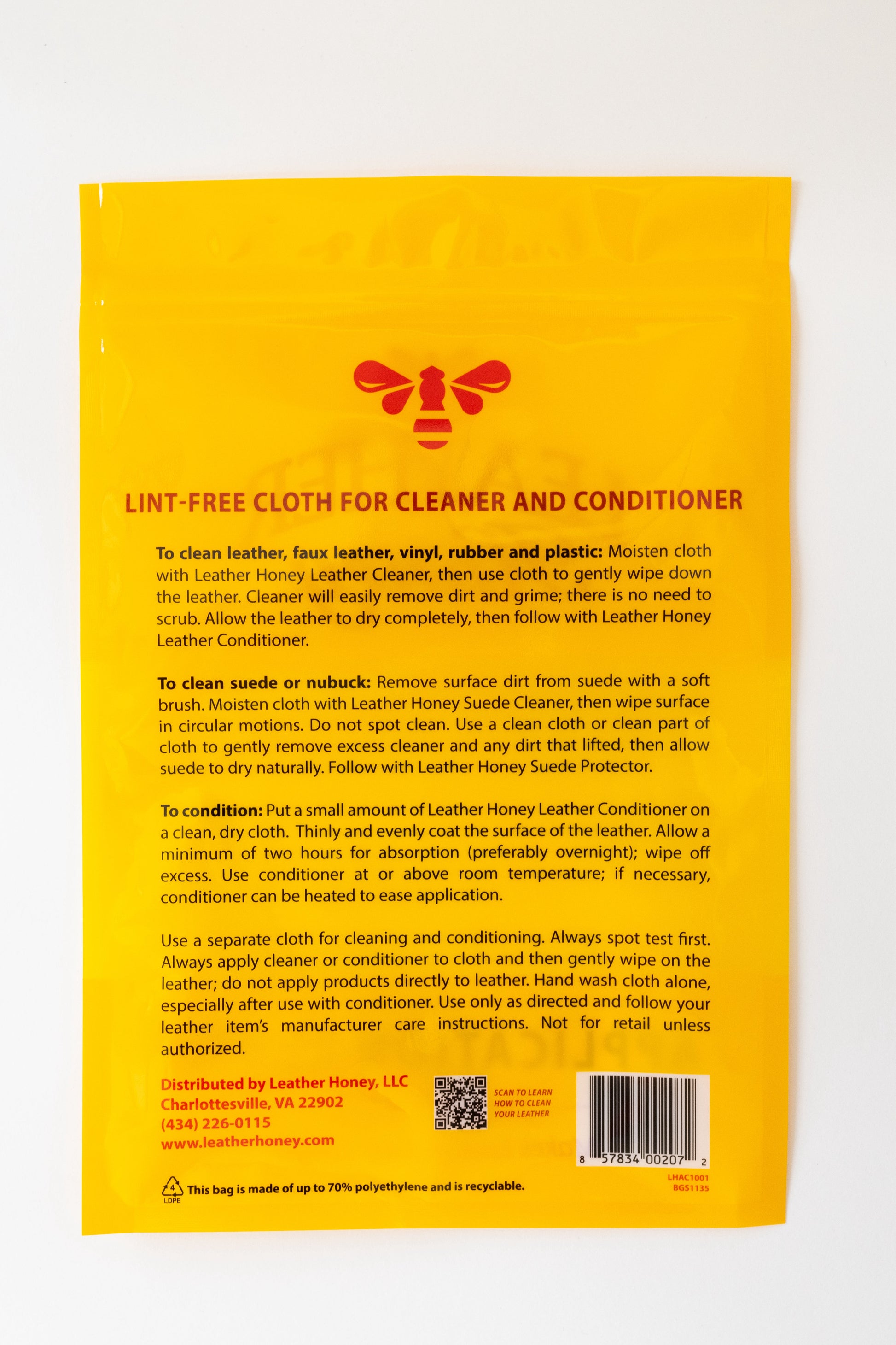 Leather Honey lint-free application cloth for leather care, shown in a close-up image of the new cloth on a leather surface.