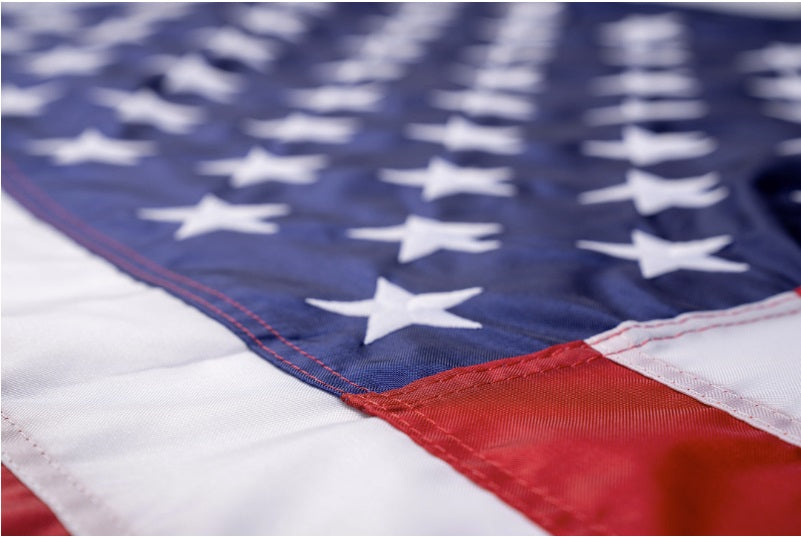Liberty™ Nylon American flag, made in USA, featuring vibrant red, white, and blue stripes with white stars on a blue field.