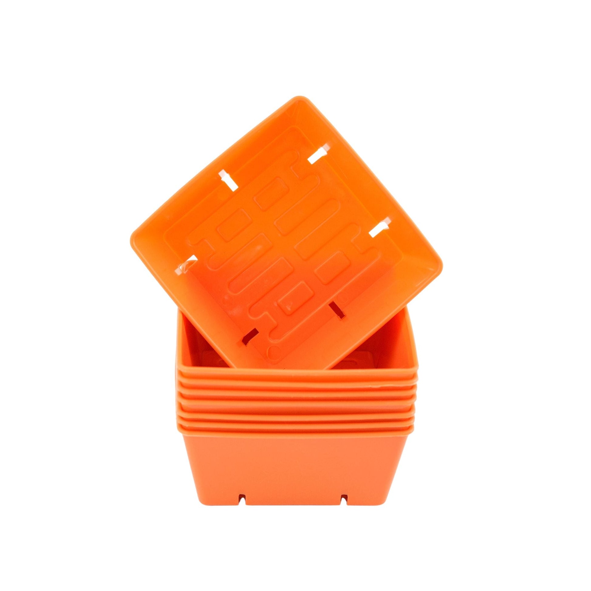 Orange Bootstrap Farmer 5x5 grow trays with extra strength inserts for seed starting and propagation.