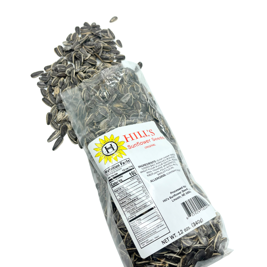 Full 12 oz bag of Hill's Sunflower Seeds with salted, roasted sunflower seeds in a clear bag, ready for snacking.