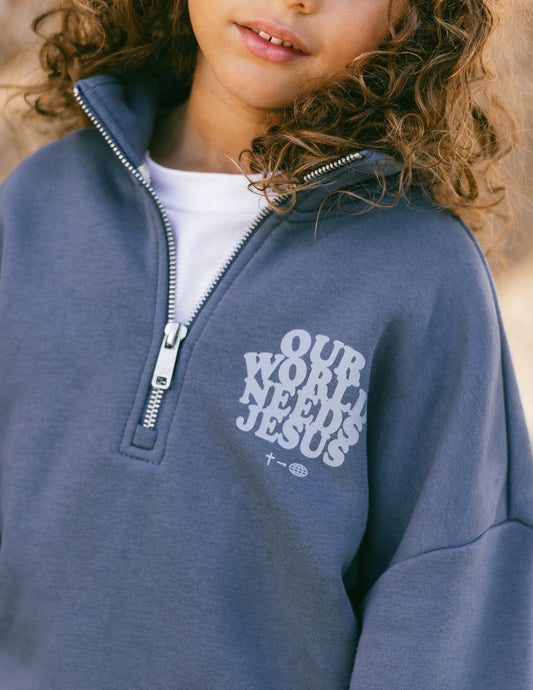 Kids jacket by Elevated Faith featuring "Our World Needs Jesus" print, with a half-zip design and comfortable fit for children.