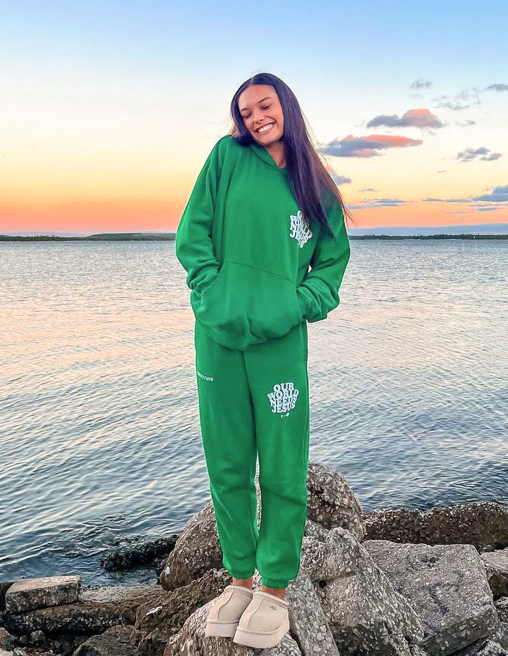 Unisex sweatpant from Elevated Faith with "Our World Needs Jesus" print, soft fabric, comfortable fit, casual style for everyday wear.