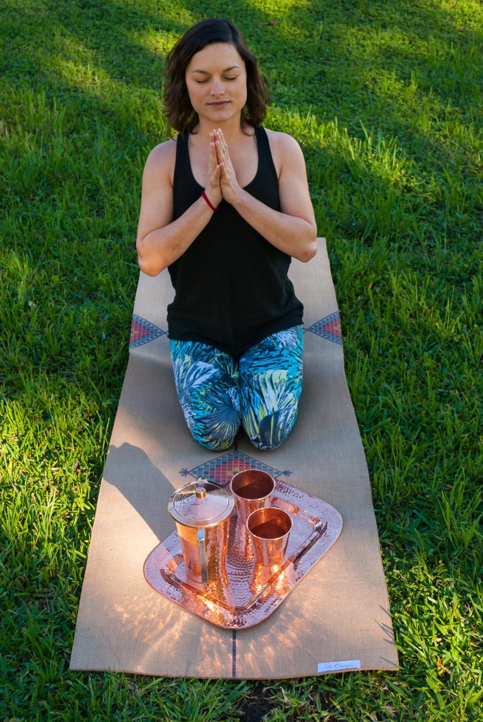 Copper Thessaly rectangle platter by Sertodo, a handcrafted plate with a polished copper finish, ideal for serving food.