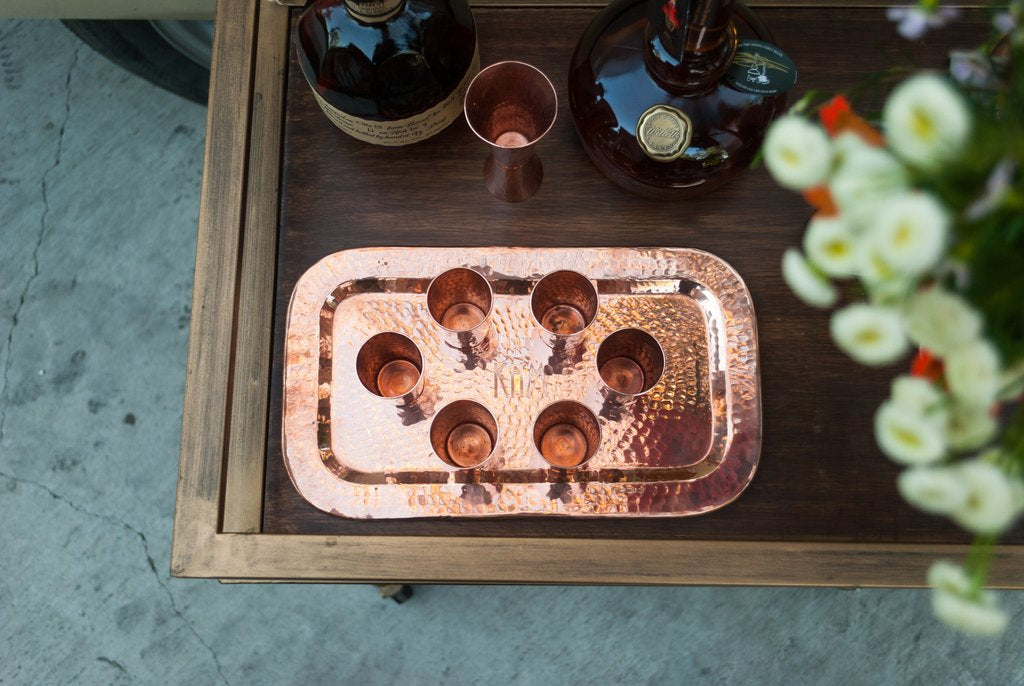 Sertodo copper Charolita tray with a polished, reflective surface, used for serving or decorative display.