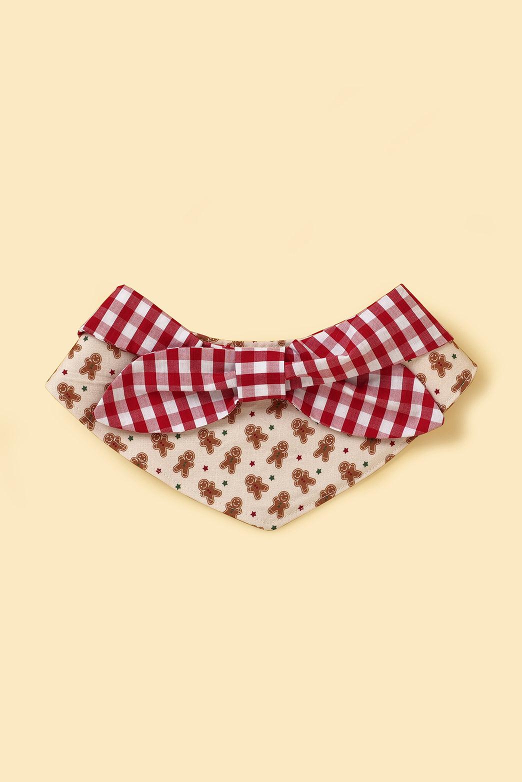 Handmade Christmas Morning Gingerbread Man gingham print baby bandana by BarkBarkBaby, featuring festive holiday design.
