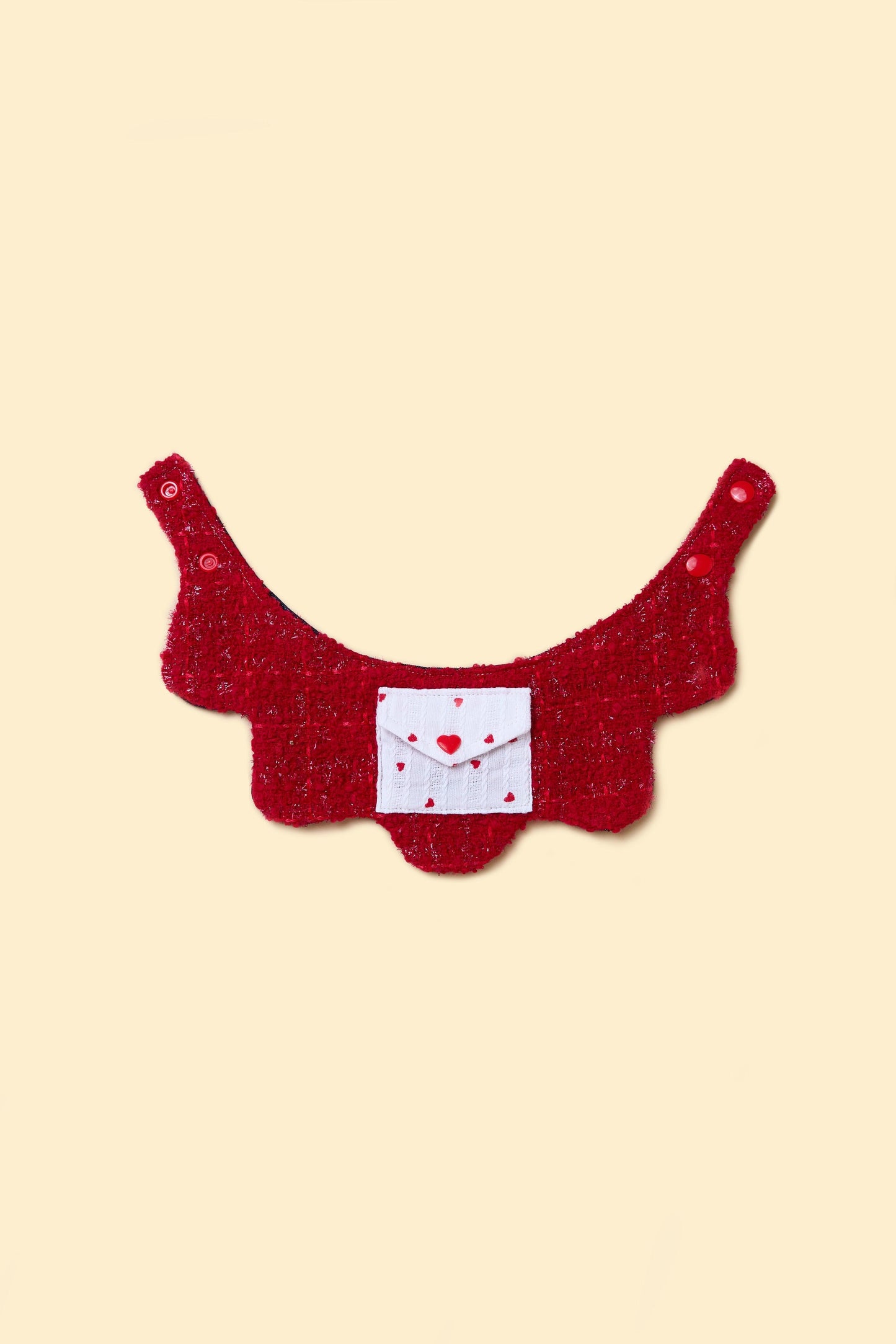 Reversible handmade BarkBarkBaby Love Note bandana with colorful heart patterns for dogs, showcasing stylish pet accessories.