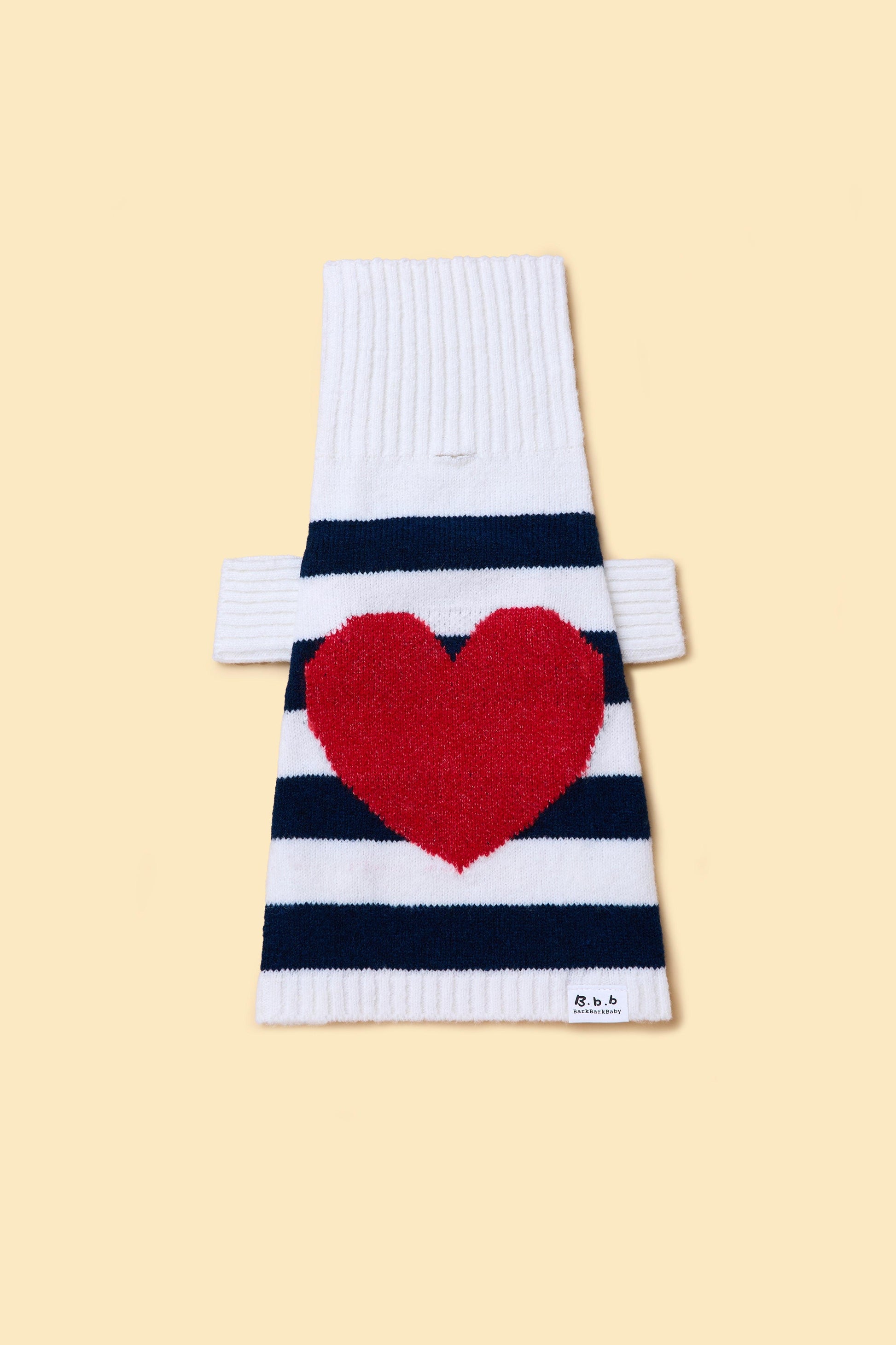 Striped turtleneck sweater for toddlers from BarkBarkBaby featuring sailor-inspired design and navy blue and white stripes.