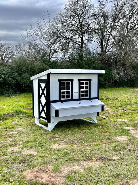 Large OverEZ Chicken Coop with spacious design for up to 15 chickens, featuring durable construction and secure nesting areas.