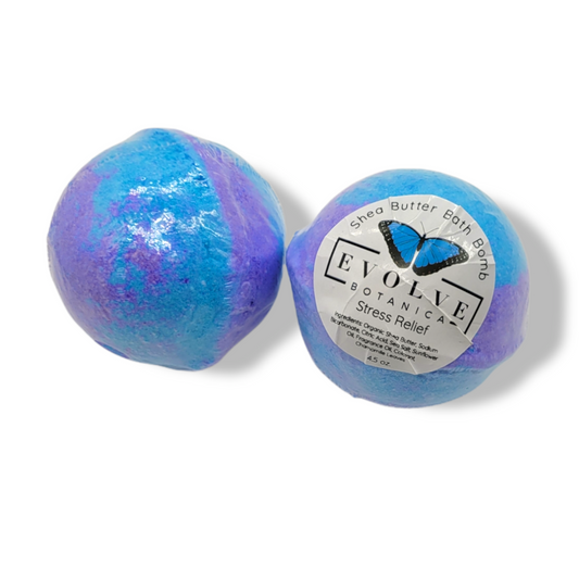 Evolve Botanica stress relief bath bomb with vibrant colors and floral accents, designed for relaxing bath experiences.