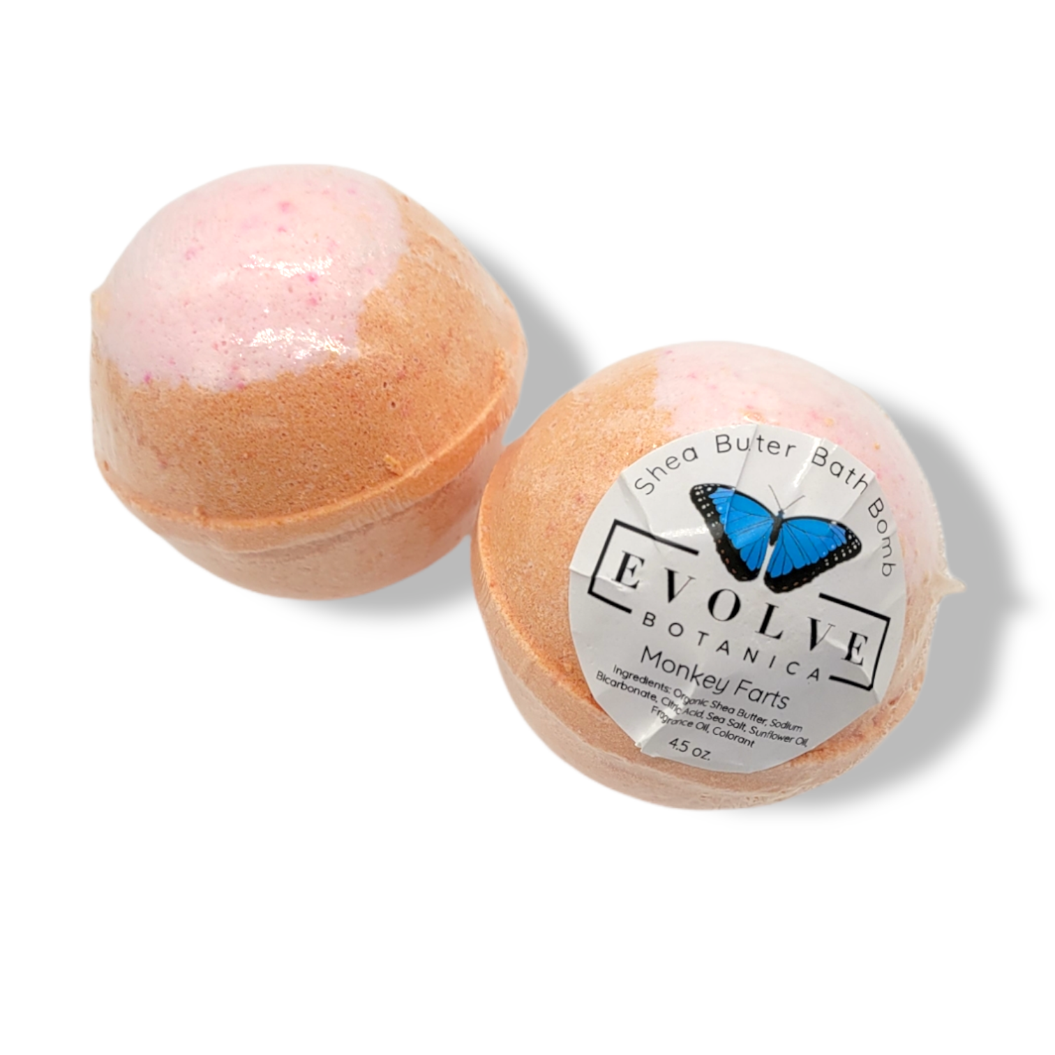 Evolve Botanica Monkey Farts bath bomb with colorful swirls and playful design, perfect for a relaxing bath experience
