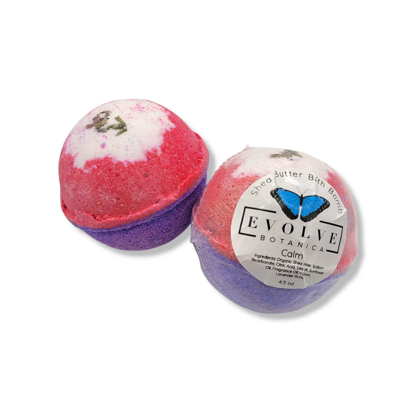 Evolve Botanica Just Calm Down bath bomb, round and colorful with natural botanicals, relaxing spa product for calming baths.