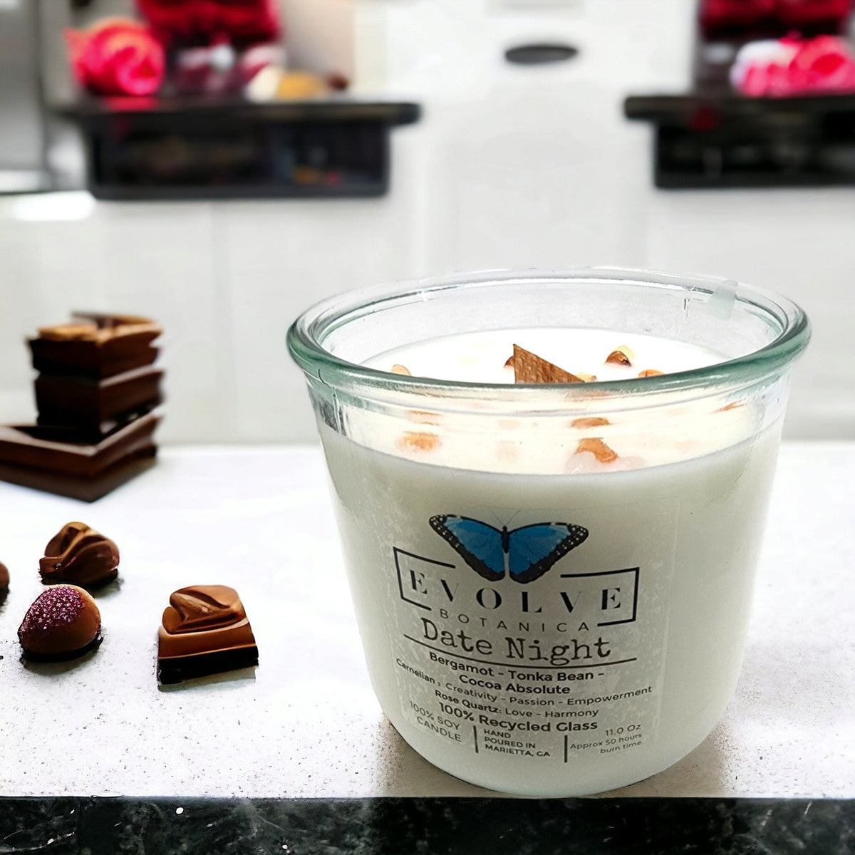 Evolve Botanica Rocks Candle Date Night with rose quartz and carnelian gemstones, soy wax, and wood wick for a romantic ambiance.