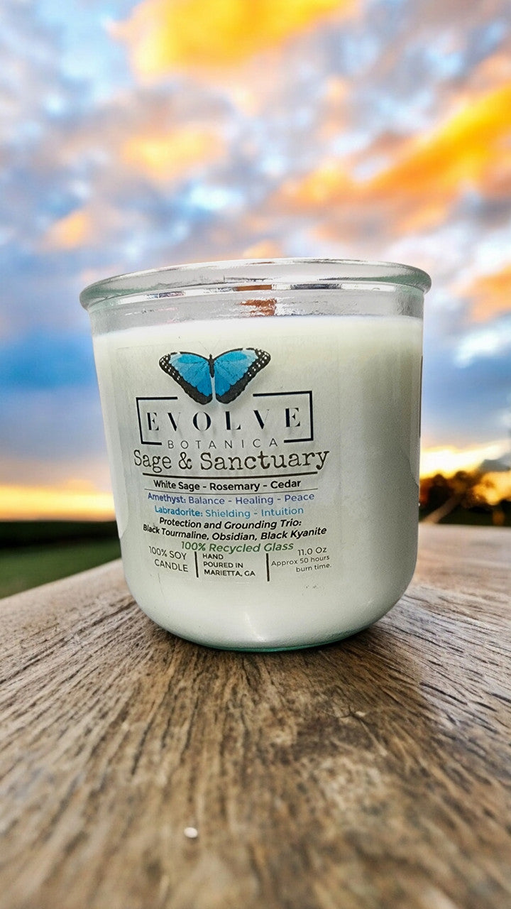 Rocks Candle by Evolve Botanica featuring black kyanite, black tourmaline, obsidian, amethyst, and labradorite crystals.
