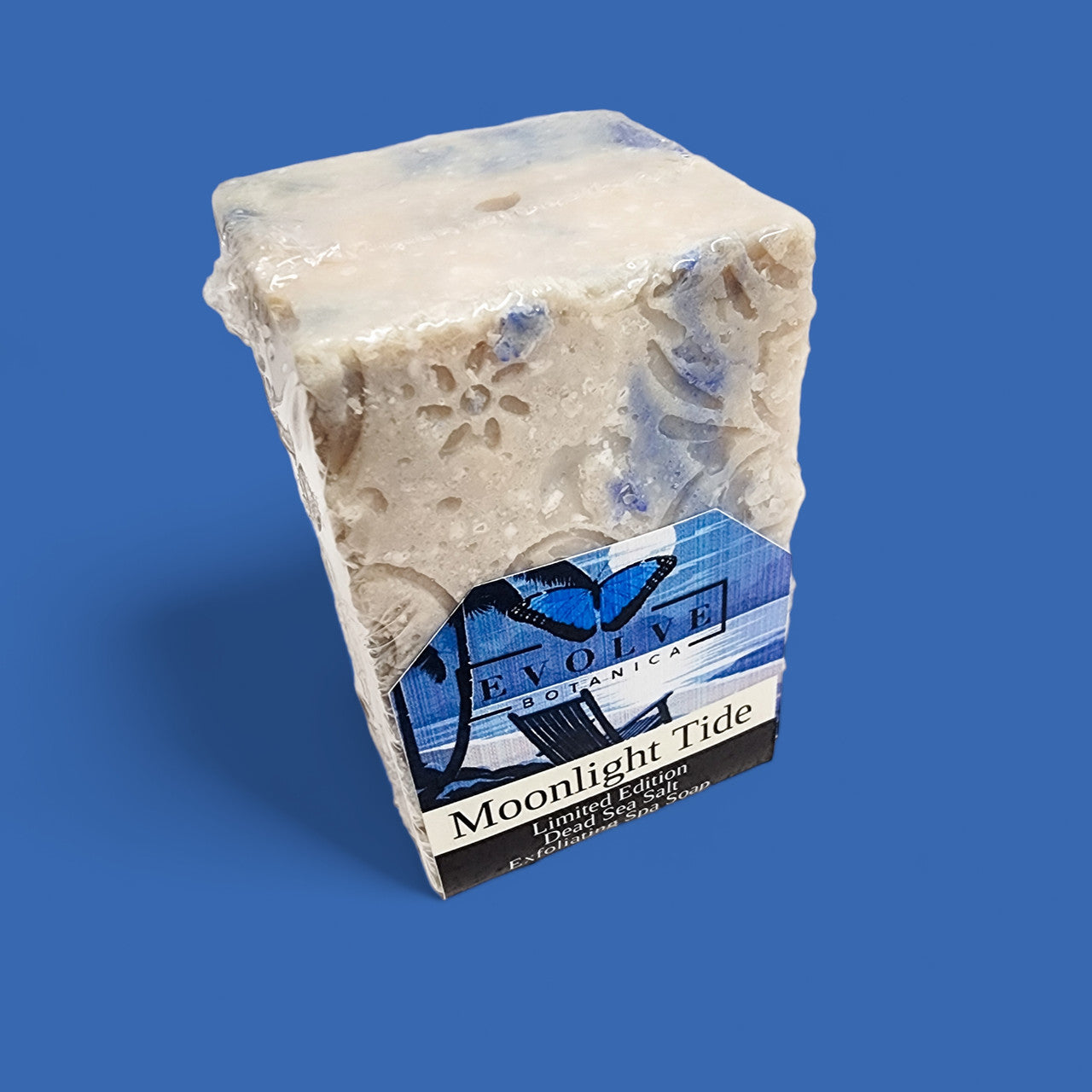 Evolve Botanica Moonlight Tide salt bar soap with a natural, textured surface in a sleek, minimalist packaging.