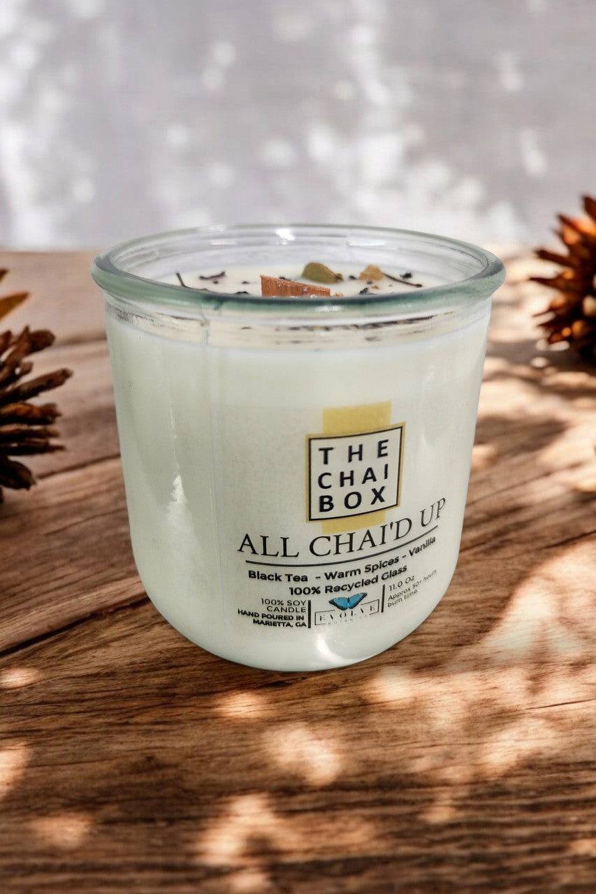 Evolve Botanica Rocks Candle Chai with wood wick and gemstone details, soy wax candle in a decorative jar.