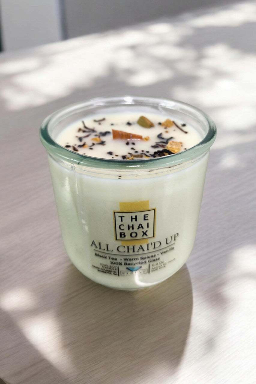 Evolve Botanica Rocks Candle Chai with wood wick, gemstone soy candle in a glass jar, cozy and aromatic home decor.