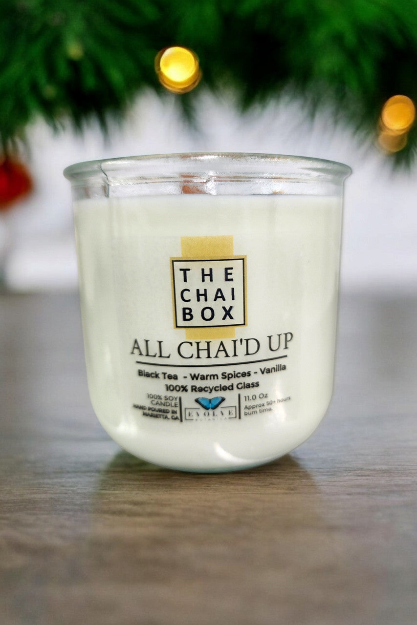 Evolve Botanica Rocks Candle Chai with wood wick and gemstone accents, soy wax candle in a clear glass jar.