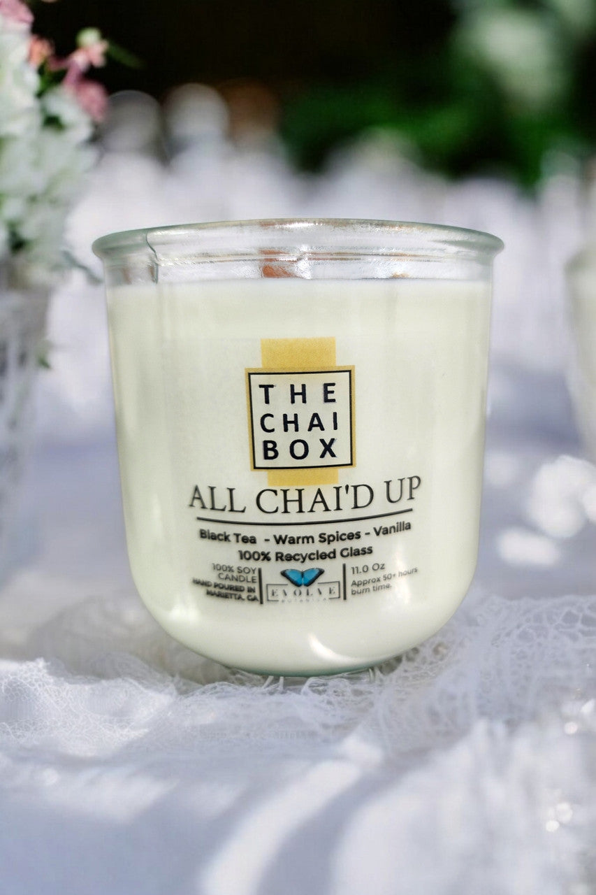 Evolve Botanica Rocks Candle Chai with wood wick and gemstone, soy wax in a decorative glass container for cozy ambiance