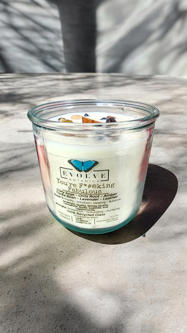Rocks Candle by Evolve Botanica featuring amethyst, quartz, smoky quartz, cacoxenite, rutile, goethite, and lepidocrocite crystals.