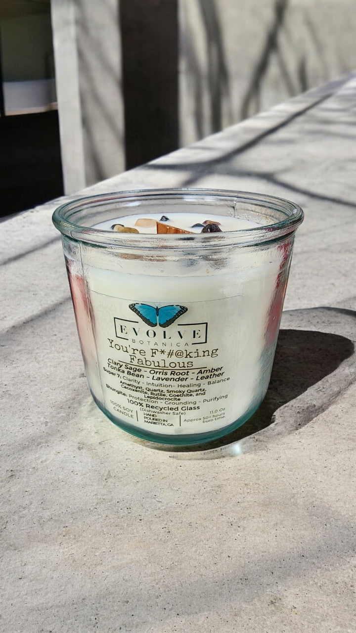 Rocks Candle by Evolve Botanica featuring amethyst, quartz, smoky quartz, cacoxenite, rutile, goethite, and lepidocrocite crystals.