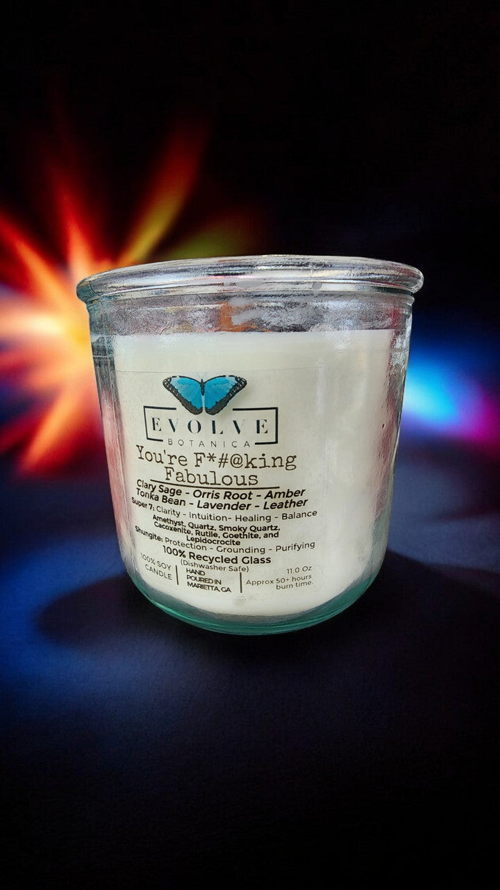 Evolve Botanica Rocks Candle with amethyst, quartz, smoky quartz, cacoxenite, rutile, goethite, and lepidocrocite crystals.