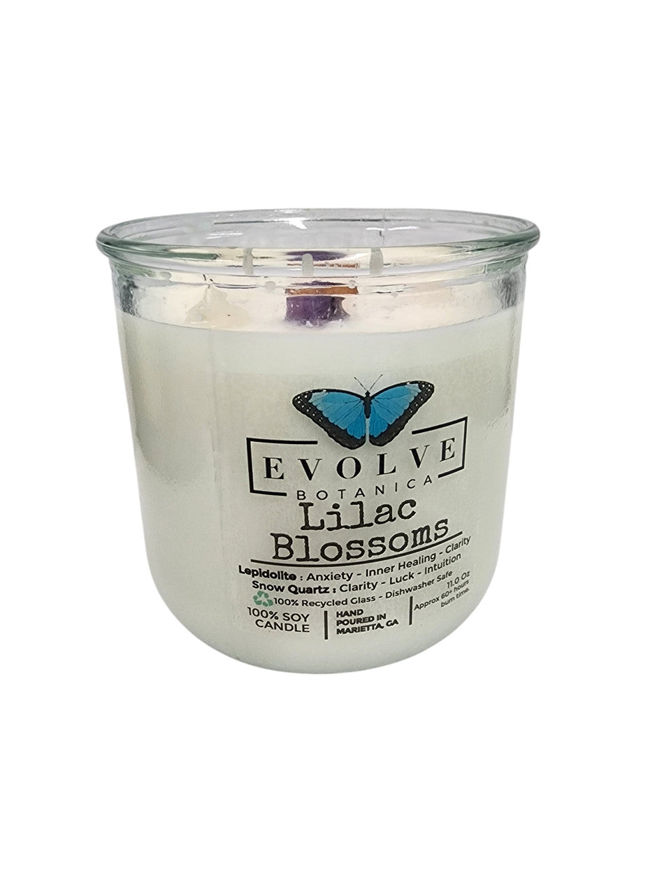 Lilac Blossoms Rocks Candle by Evolve Botanica featuring a wood wick and Lepidolite gemstone, set in a soy candle holder.