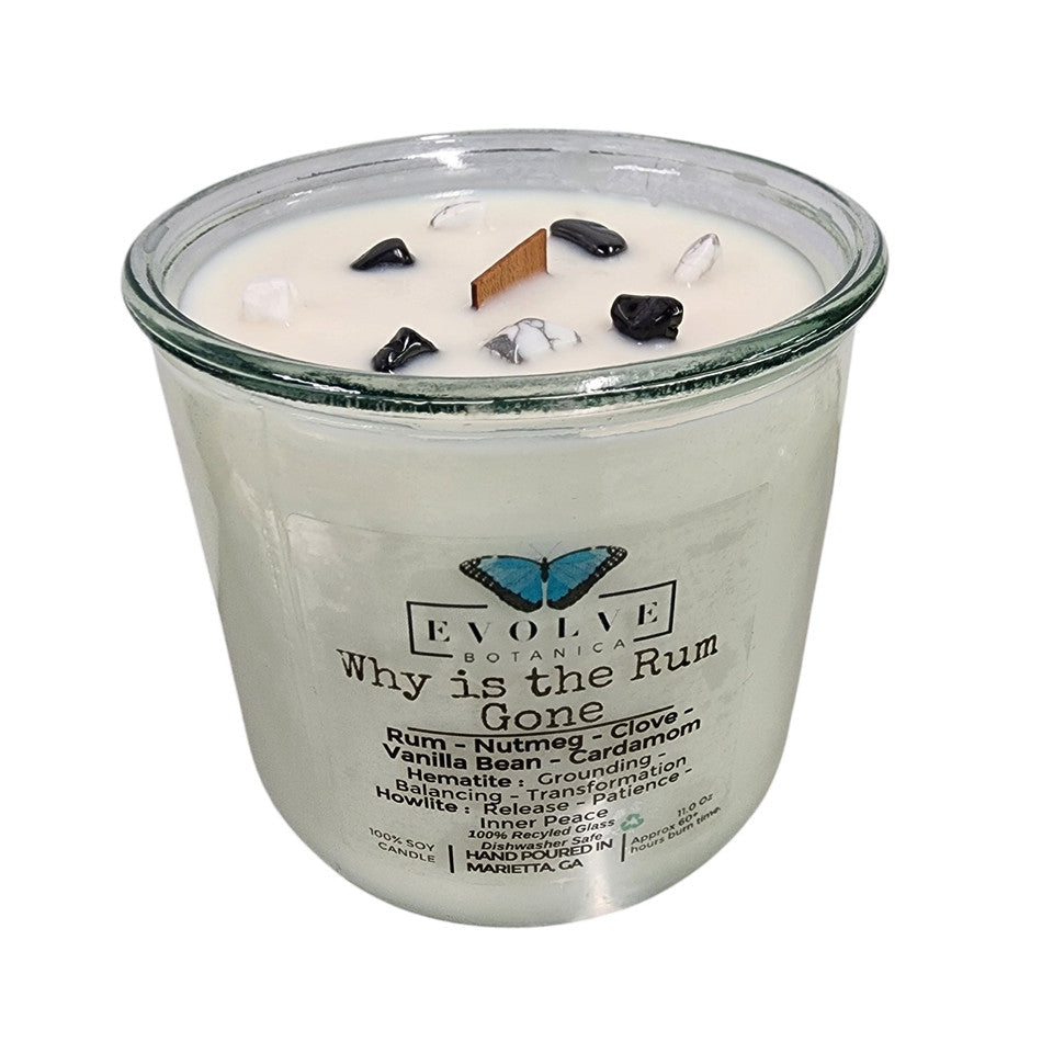 Rocks Candle by Evolve Botanica featuring hematite and howlite stones, with a wood wick for grounding, balancing, and peaceful ambiance.