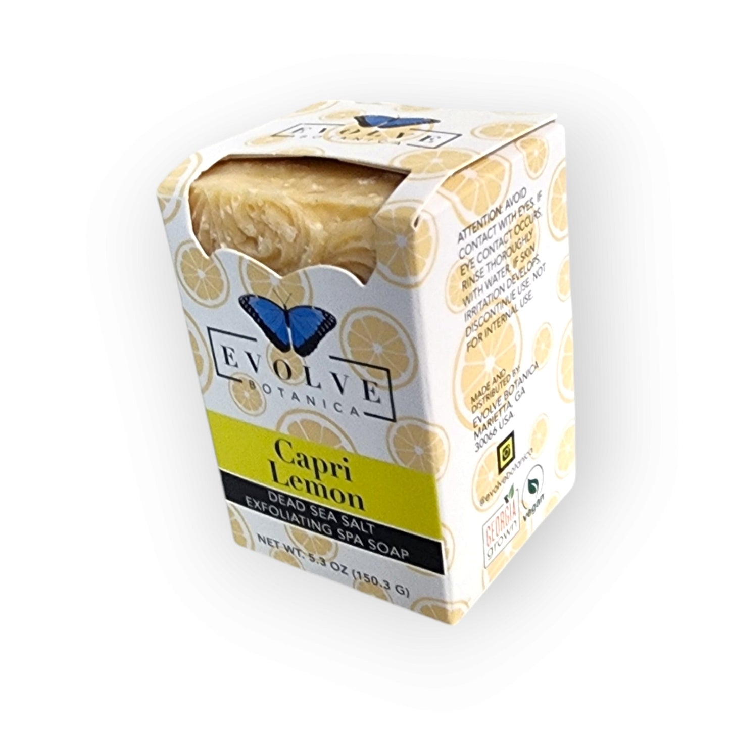 Evolve Botanica Capri Lemon salt soap bar with fresh lemon slices and botanical ingredients on a neutral background