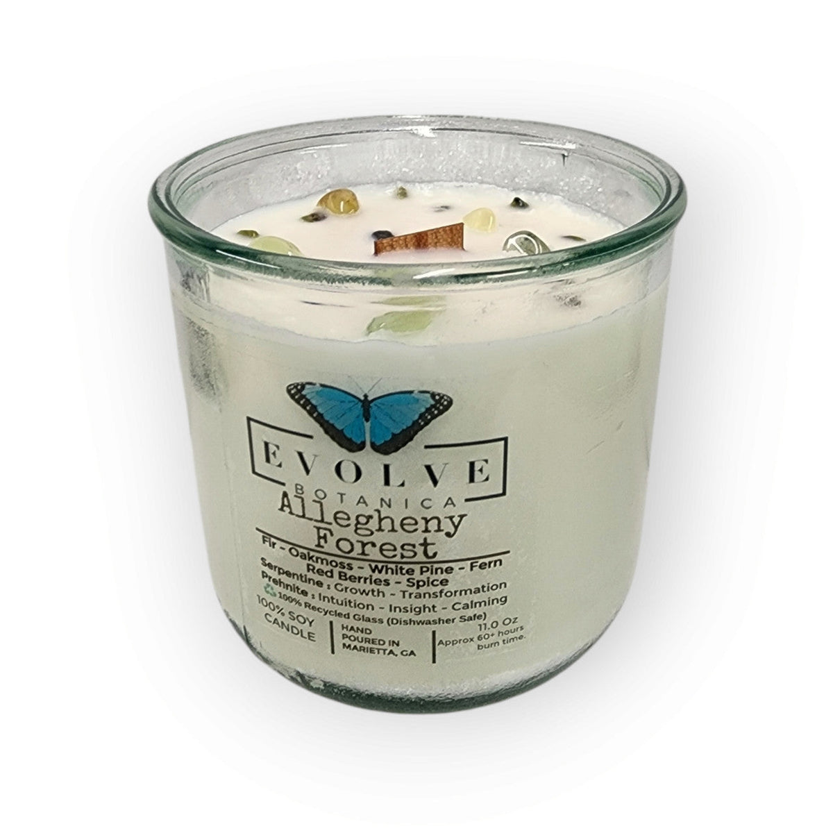 Evolve Botanica Rocks Candle Falling Leaves with gemstones, soy wax, wood wick, featuring Peridot, Red Jasper, and Yellow Aventurine.