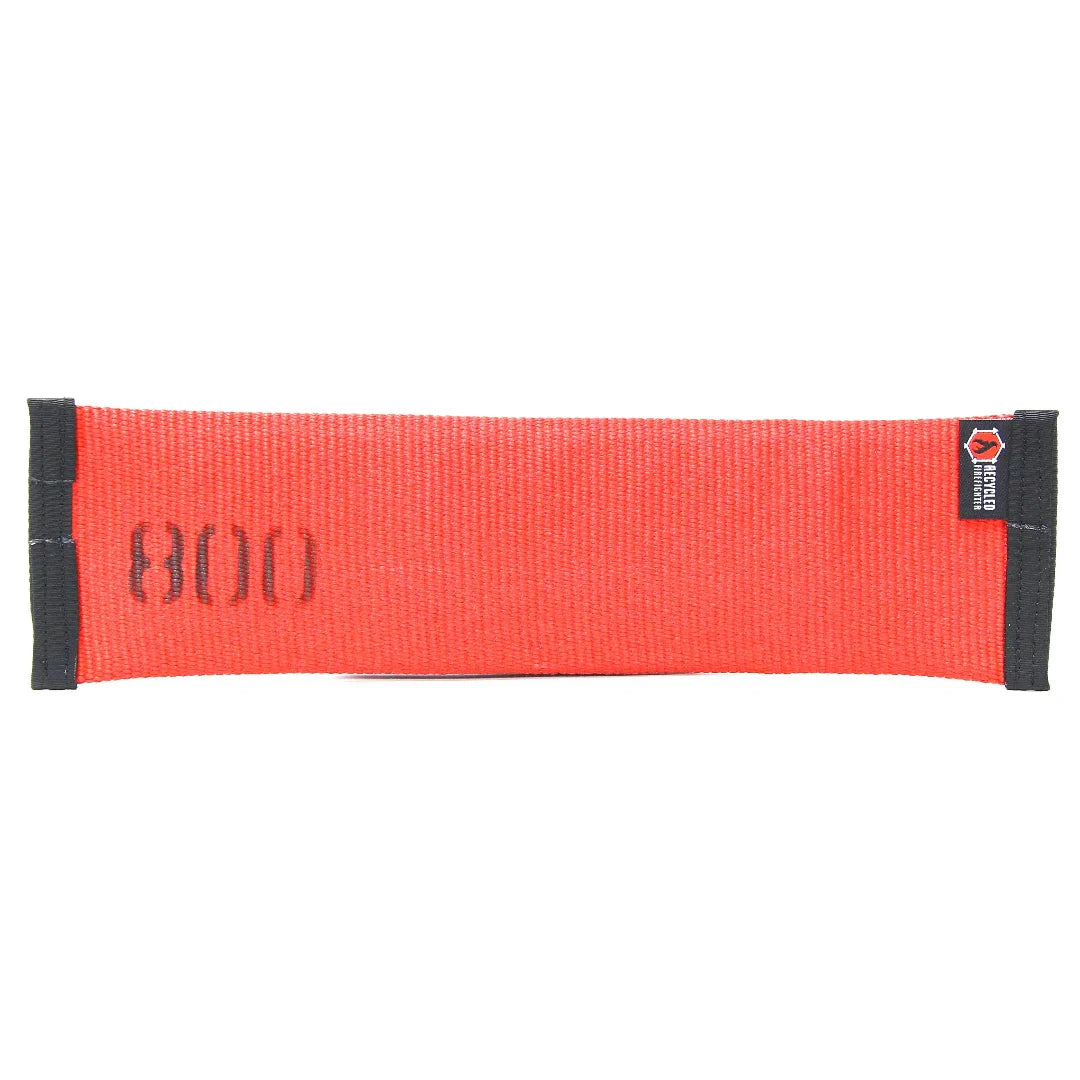 Recycled Firefighter red and black fire hose dog fetch toy, durable and eco-friendly dog toy for active play.