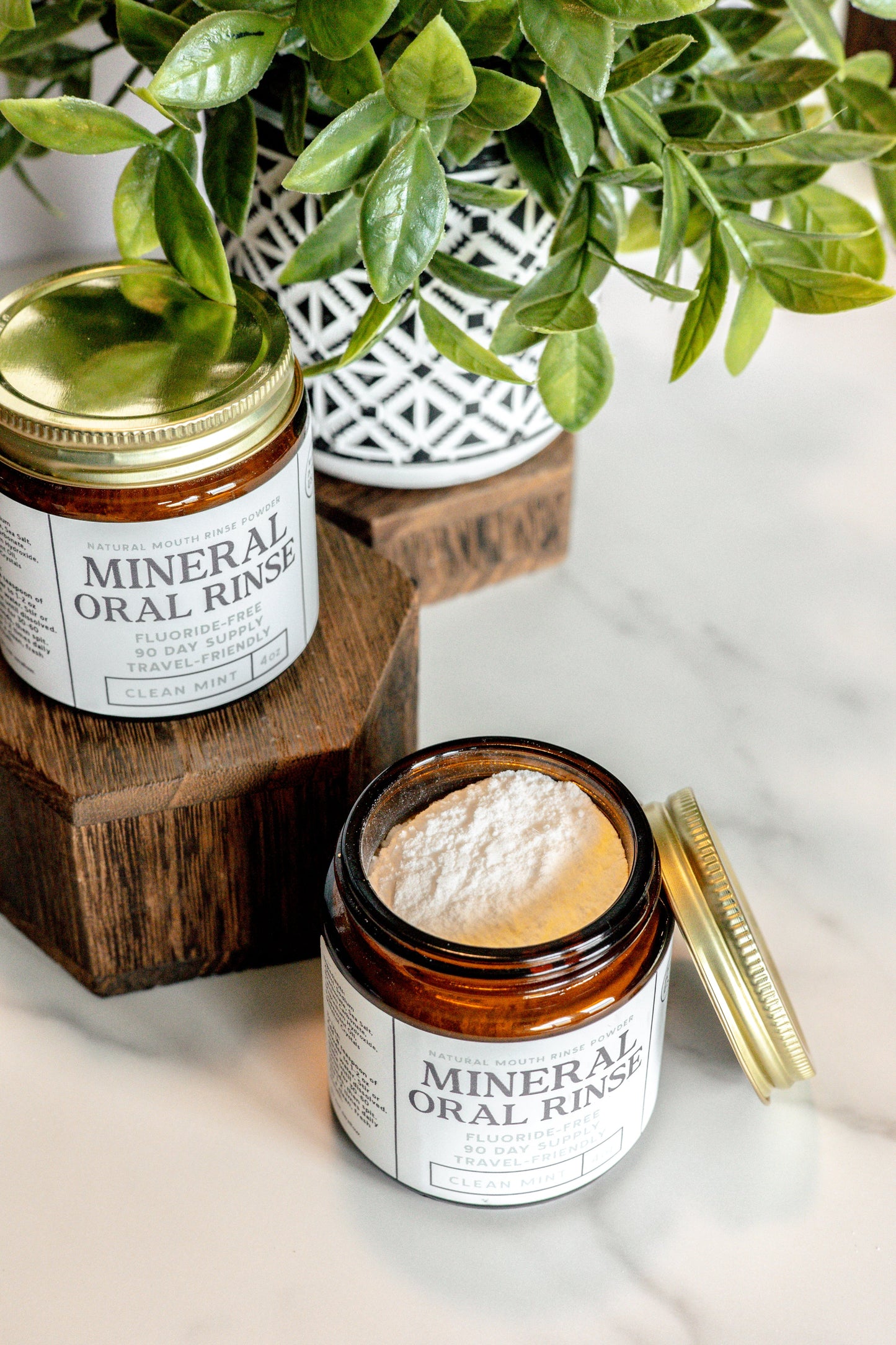 Natural oral rinse by Revive Homestead, showing a bottle of herbal mouthwash for fresh breath and oral health.
