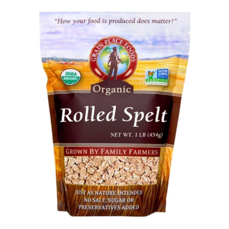 Organic rolled spelt grain in a 1 lb bag from Grain Place Foods, non-GMO, ideal for baking and healthy cooking.
