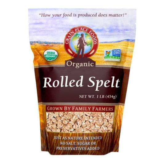 Organic rolled spelt grain in a 1 lb bag from Grain Place Foods, non-GMO, ideal for healthy cooking and baking.