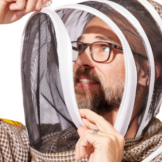 Ventilated beekeeping veil by Foxhound Bee Company with round fencing design, protective mesh for beekeeper safety.