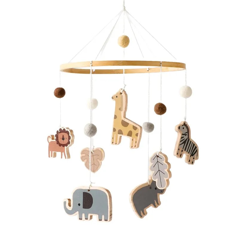 Wooden mobile hanging toys by Petite Pioneers, featuring colorful, handcrafted wooden shapes suitable for baby cribs.